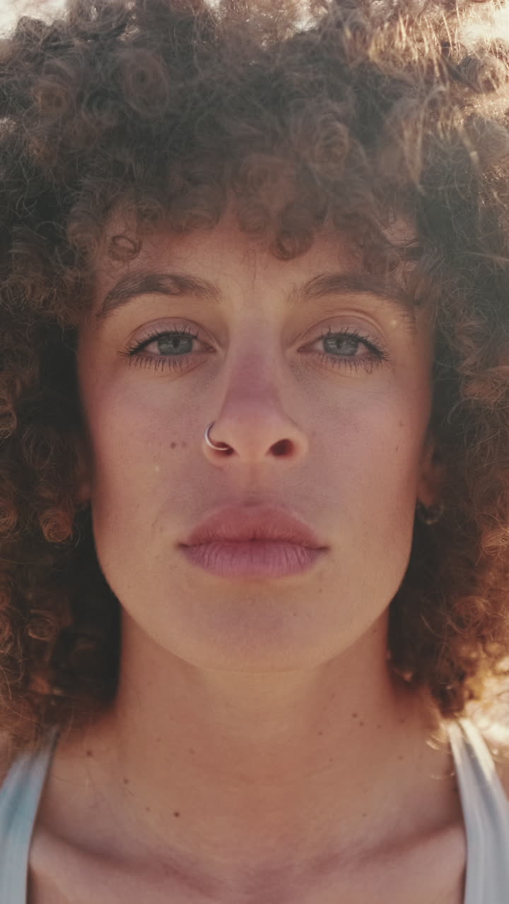 Portrait Of A Sporty Woman With Curly Hair