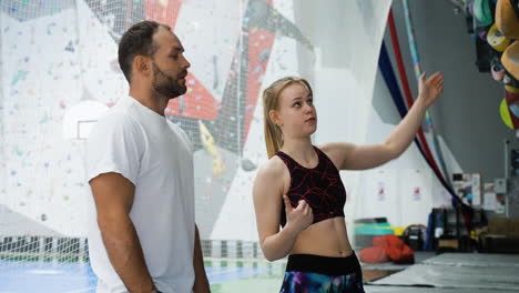 people in a climbing wall centre