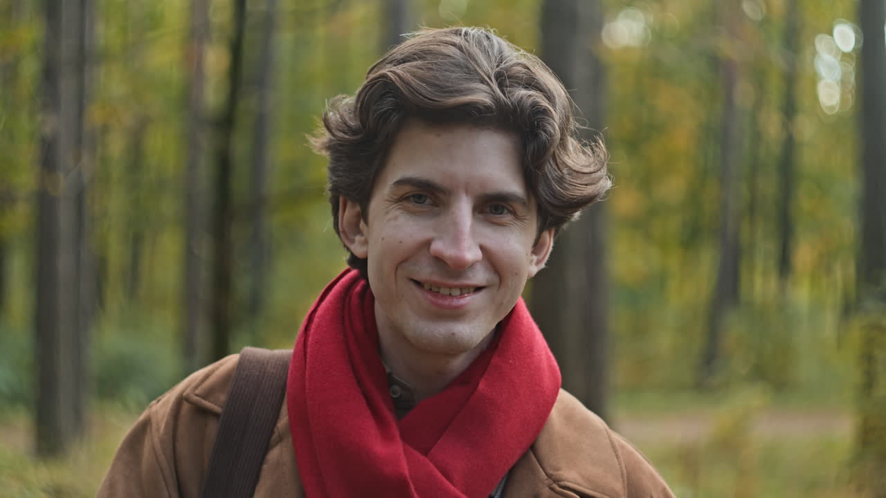 Man in Forest with Red Scarf