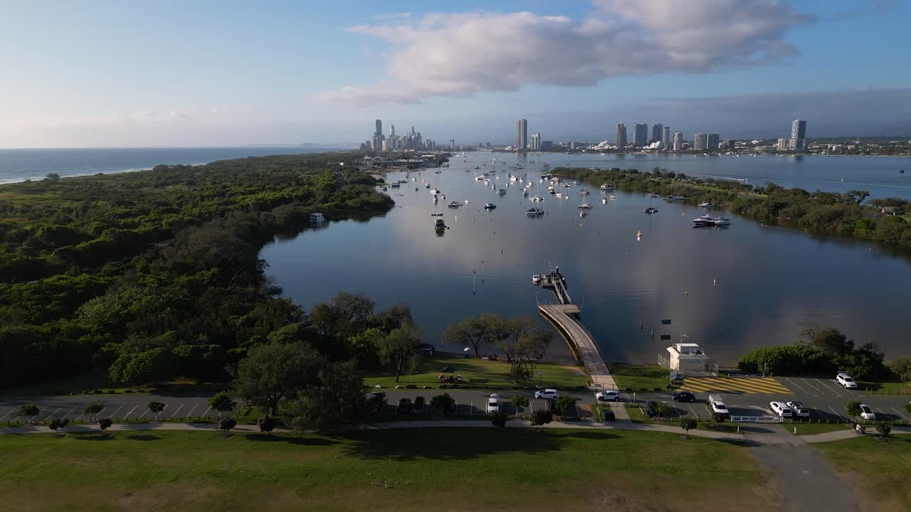 Reversing aerial facing South over the Broadwater looking towards Surfers Paradise, Gold Coast, Australia.