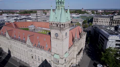 clock tower of town hall in braunschweig, germany, slow drone ascend