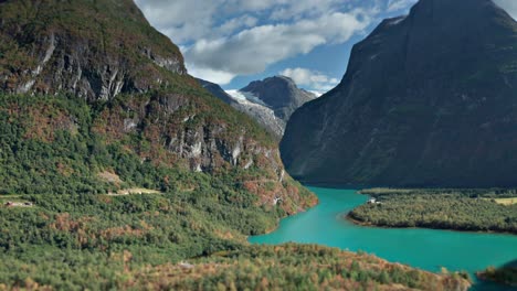 aerial shot of a loen lake valley in norway facing the jostedasbreen glacier