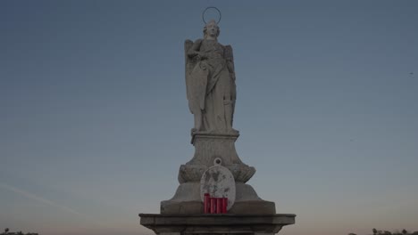 angel statue against a blue sky