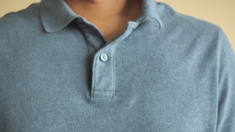 close-up of a light blue polo shirt