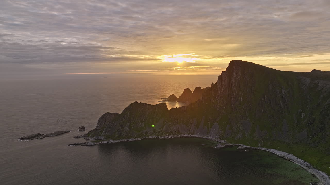 stave norway aerial v13 spectacular nature landscape view, drone flyover høyvika bay capturing coastal måtind mountaincape at sunset golden hours - shot with mavic 3 cine - june 2022