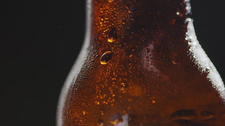 Close Up Of Condensation Droplets On Bottle Of Cold Beer Or Soft Drink With Copy Space 1