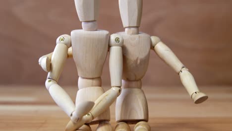 romantic couple figurines embracing each other