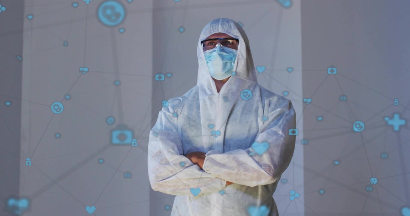 Under avspilling står en spesialist med armene i kors i et laboratorium, med blå helseikoner som pulserer rundt ham.