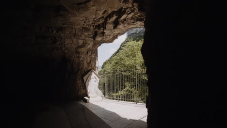 statue in a mountain cave
