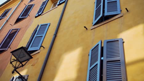 italian building with shutters and sunlight