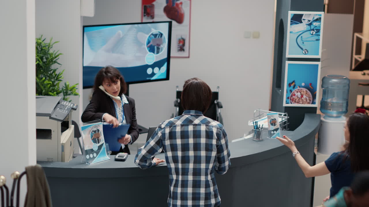 Hospital Reception Area with Patients and Staff