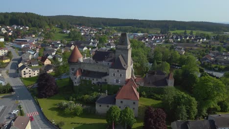 Majestic-aerial-top-view-flight-Austria-Heidenreichstein-castle-in-Europe,-summer-of-2023