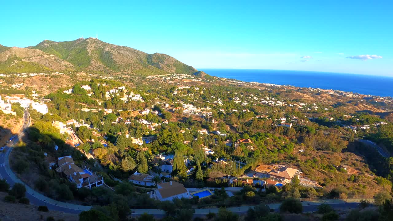 Walk along scenic sidewalk overlooking mijas pueblo spain