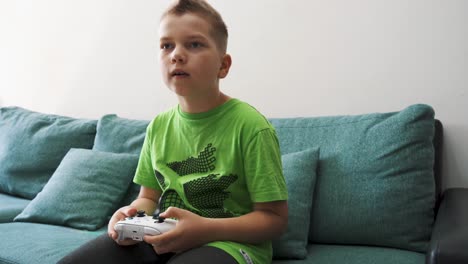 kid plays console