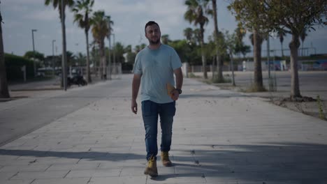 man walking on city street