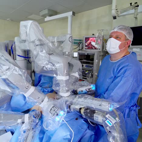 robotic assisted minimally invasive surgery with surgical robot. robotic surgical system in hospitals concept. da vinci surgery