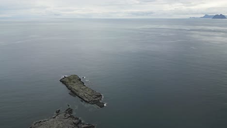 Flying-over-last-islands-before-the-open-ocean-in-Northern-Europe-Norway-dramatic-landscape