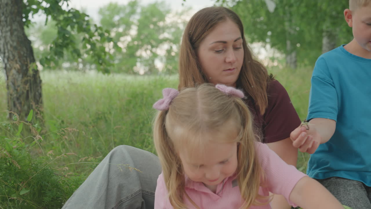 Family fun outing, Smiling family members sharing joyful moments in bright sunlight outside, Cheerful family gathers outdoors to celebrate and create lasting happy memories during sunny day