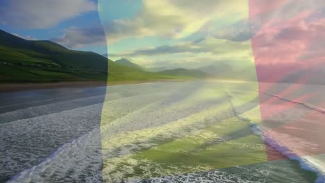 Digital-composition-of-waving-belgium-flag-against-aerial-view-of-the-beach-and-sea-waves