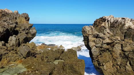 this video reveals the oceans beauty with waves crashing on cliffs this video showcases the oceans beauty with powerful waves crashing against a rugged shoreline creating a mesmerizing scene of natures force