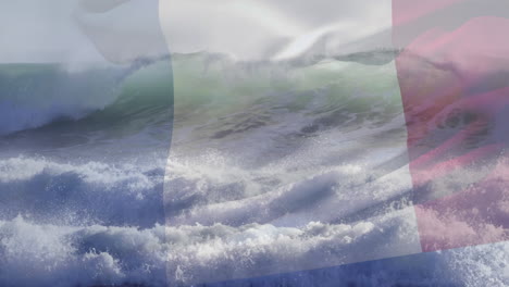 animation of flag of france blowing over crashing waves in sea