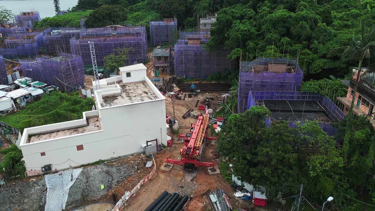 aérea sobre la nueva construcción en la isla de ma wan, hong kong, china