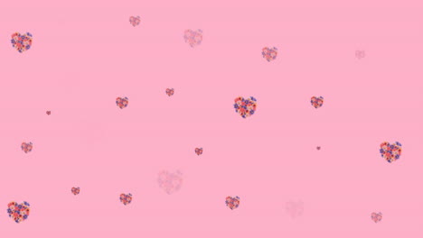 animación de flores que se mueven en movimiento hipnótico sobre un fondo rosa