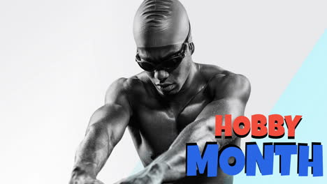 animation of hobby month text in red and blue with male swimmer preparing to dive