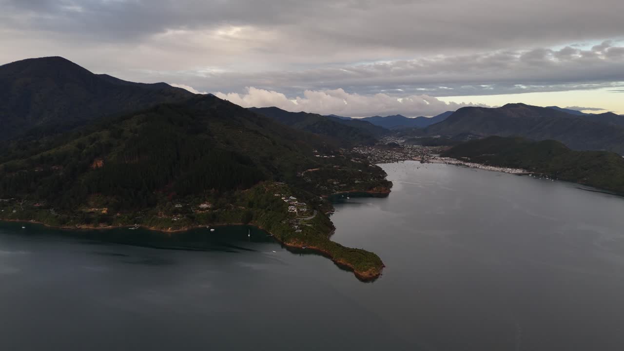 Picton Port in Marlborough Sounds, mountains, South Island, New Zealand. Aerial drone panoramic view, panning