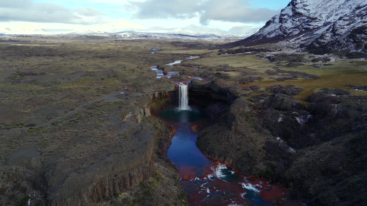 Smooth dolly shot glides over Agrio Waterfall, capturing its majestic flow and natural beauty