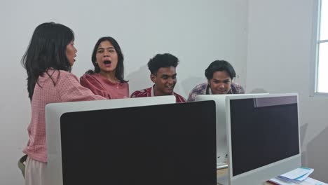 team surprised by computer screen