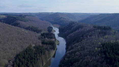 Big-Calm-River-Flowing-in-the-Valley-With-Green-Trees-on-the-Bank-Dolly-in-Shot