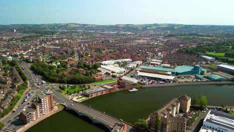 Travelling aerial GV of Belfast City Centre, Northern Ireland, UK on a bright and sunny day. Produced in 4K, 60FPS and with Rec709 color