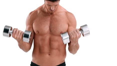 Serious-muscular-man-lifting-dumbbells-