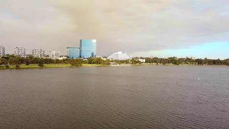 aerial reverse view over the swan river looking towards the crown casino, burswood