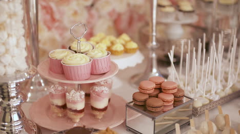 cute candy bar with various cakes and candies wedding candybar 3