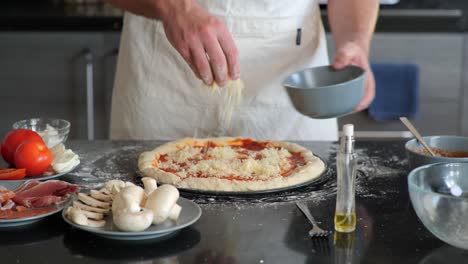 a pizza chef adding fresh mozzarella cheese to pizza dough while making a traditional pizza pie