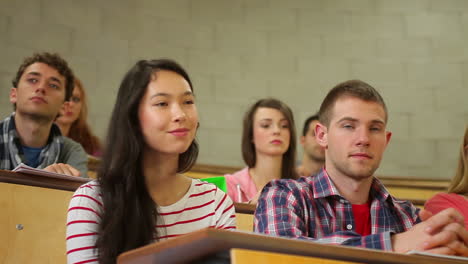 students listening carefully in lecture hall