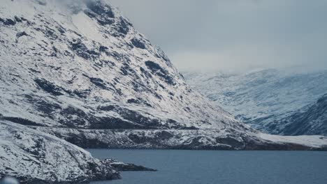 The-fresh-first-snow-covers-the-gentle-mountain-slopes