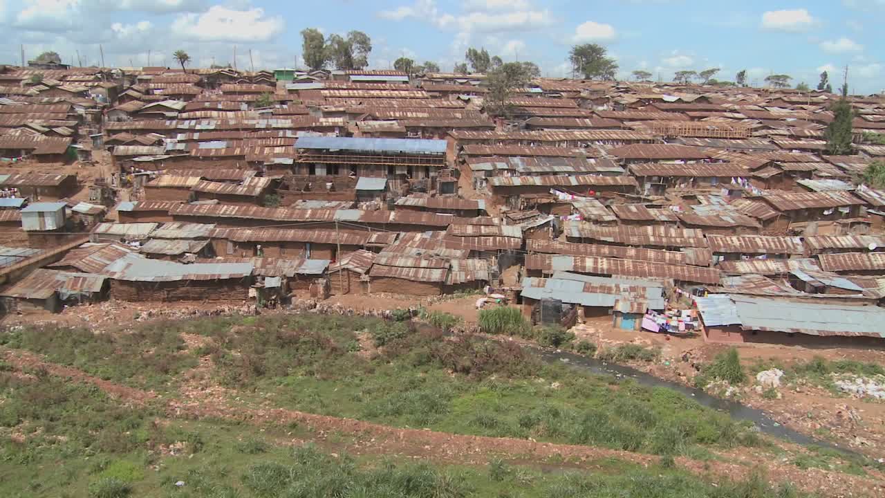 Pan across a slum in Nairobi Kenya