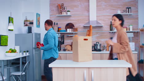 Husband-and-wife-taking-out-vegetables