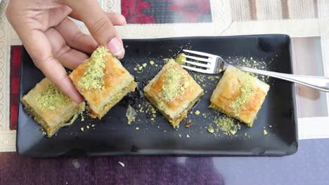 woman eating baklava