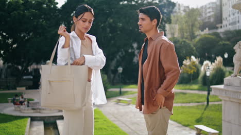 Business-partners-sunny-street-meeting.-Latina-colleagues-shaking-hands-at-park