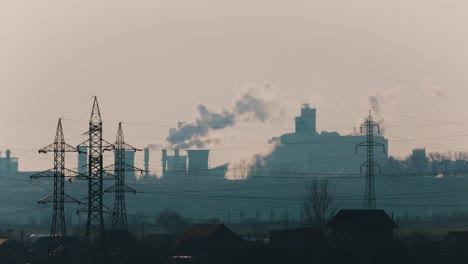 smoke rising to the sky from the factories of galati city in romania -wide