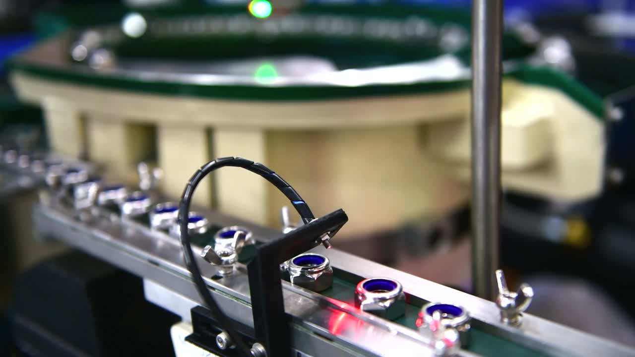 Automatic vision system for inspection nuts in product line