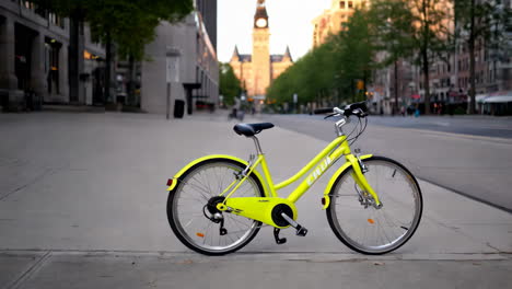 yellow bicycle on city street