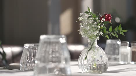 table setting with flowers and berries