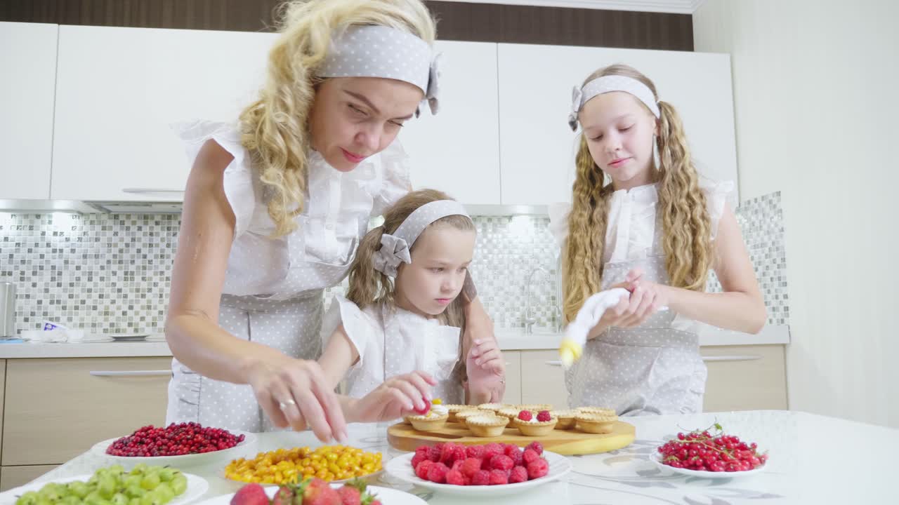 Mother and Daughters Baking Together