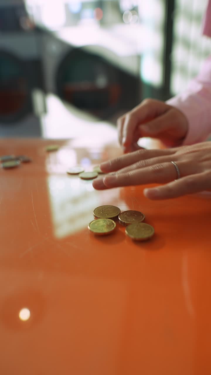 Woman playing a game with coins