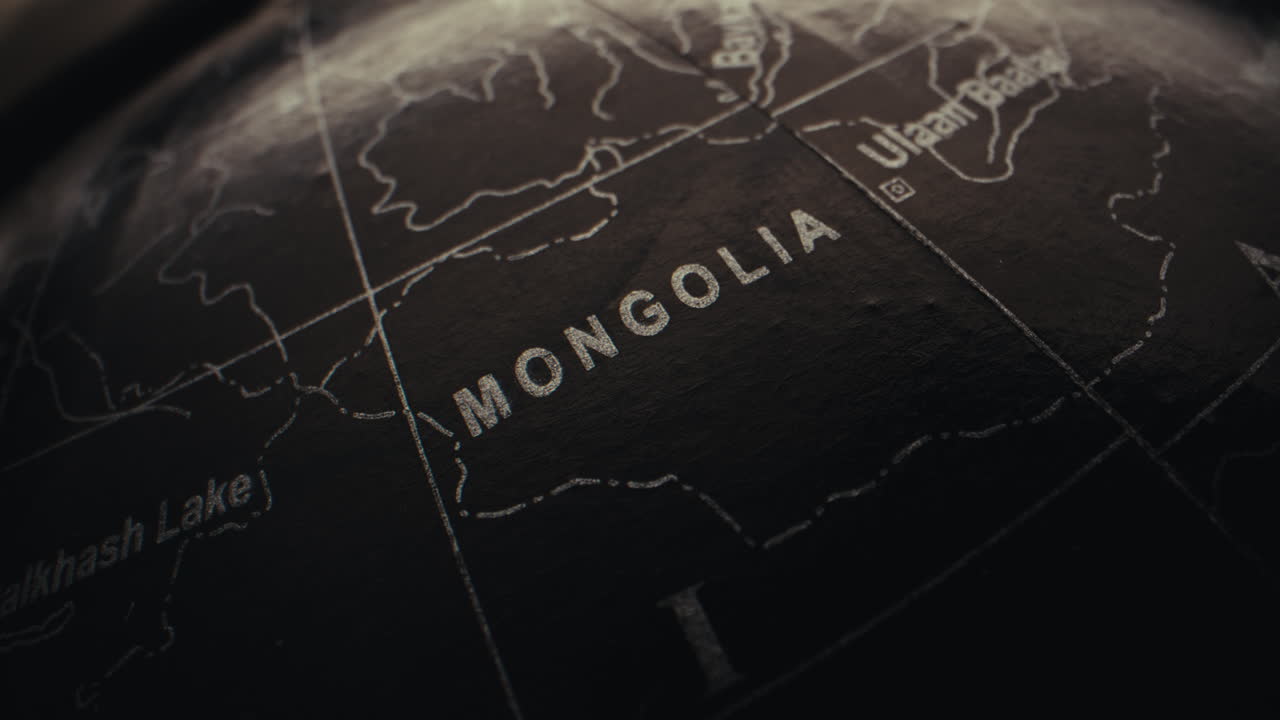 Close-up of a globe focusing on Mongolia